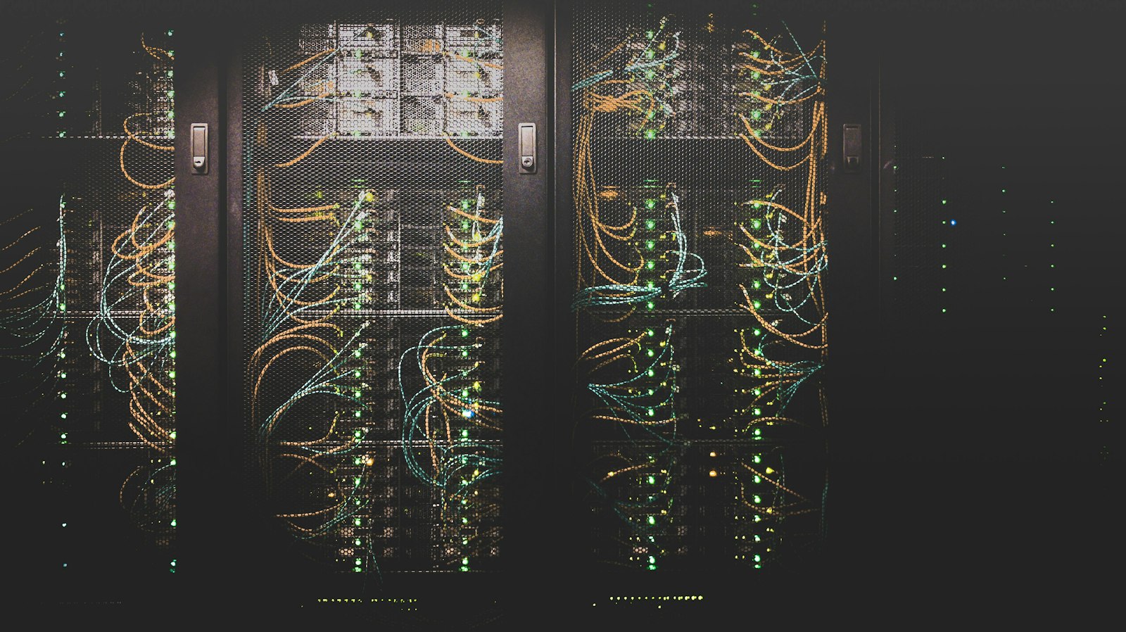 Server racks with blue lights in a data center