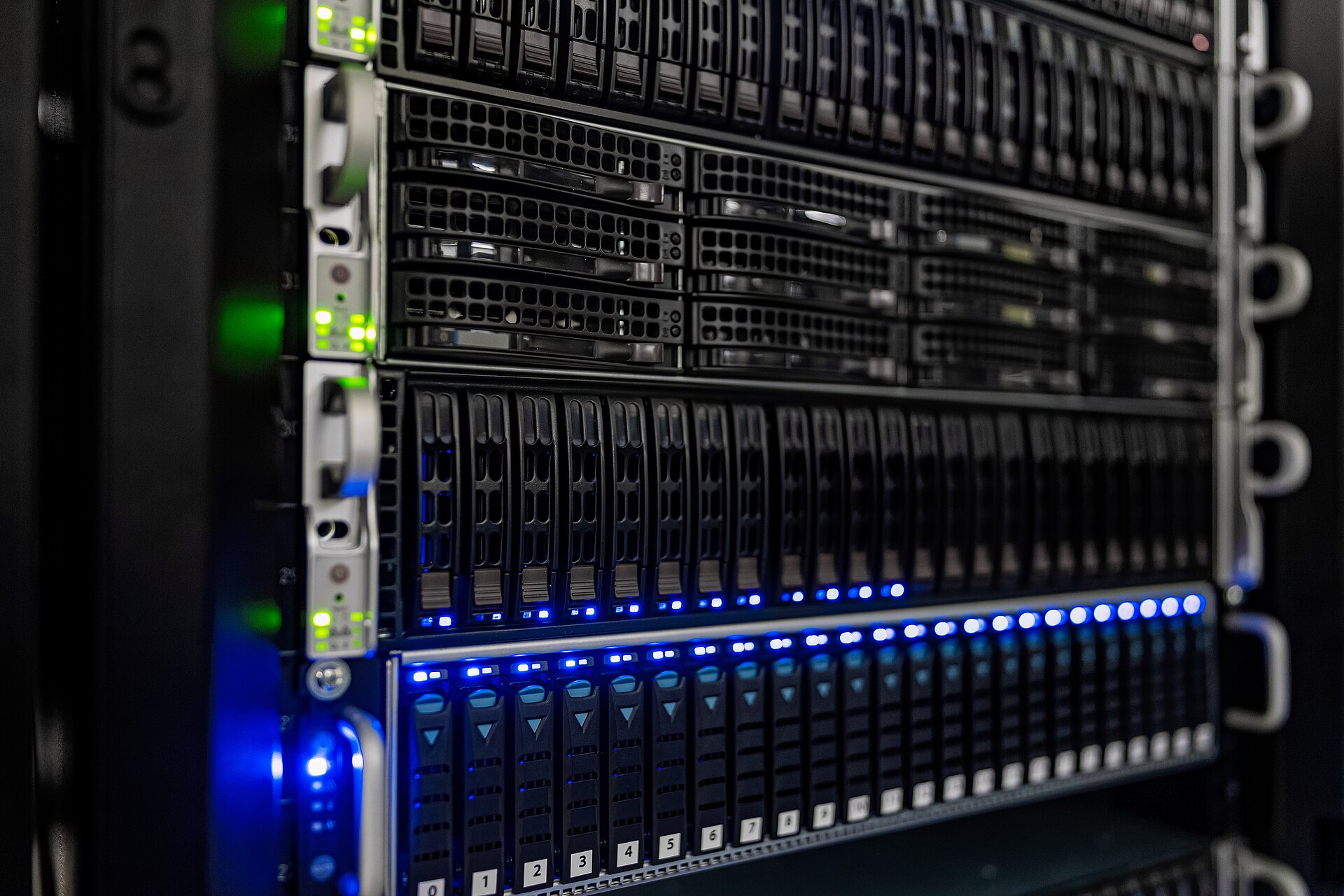 Secure server cabinets standing side by side in a data center